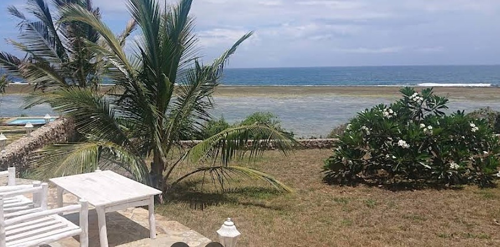 The main beach house terrace overlooking the ocean