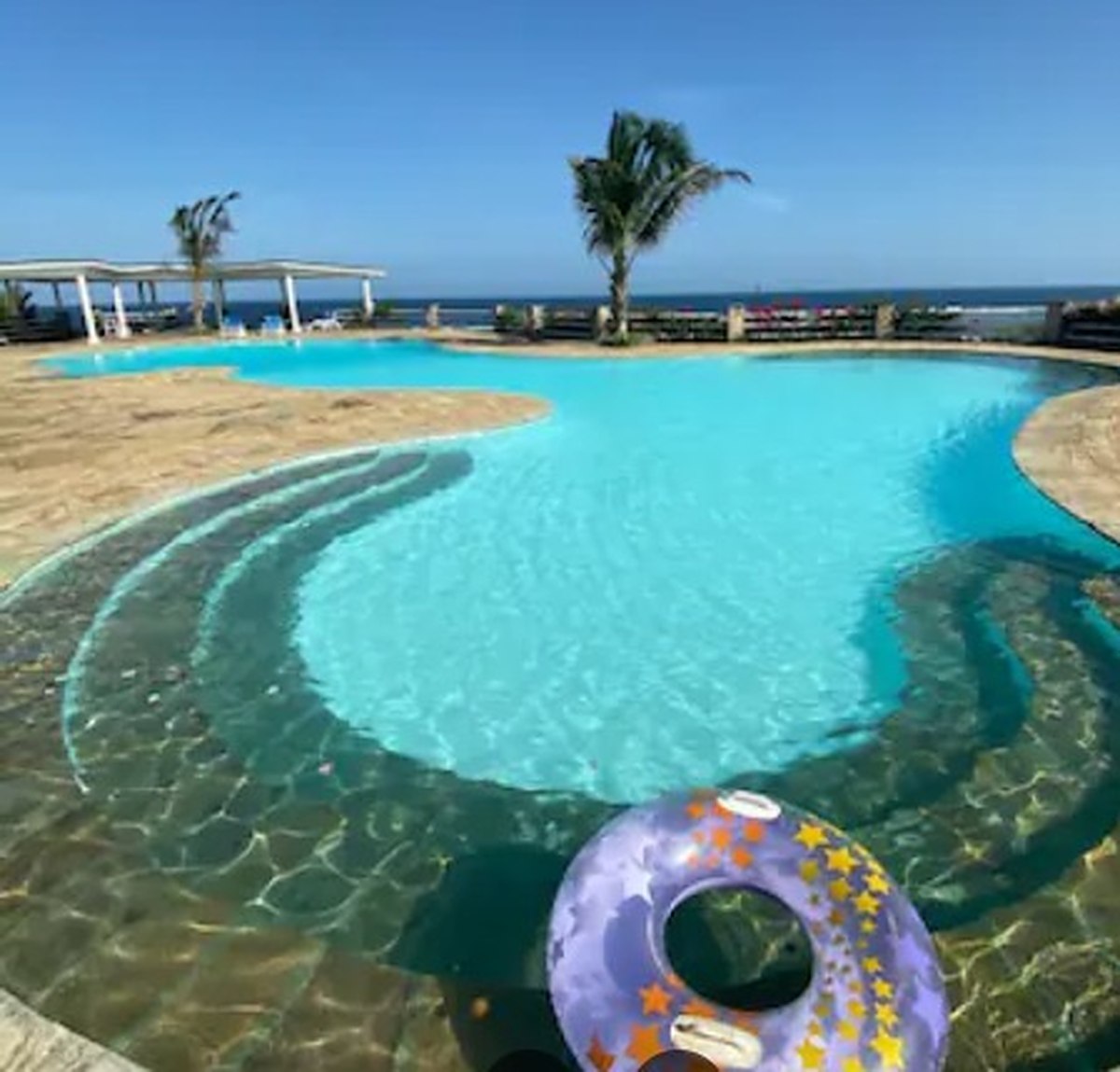 The lagoon cottage pool by day